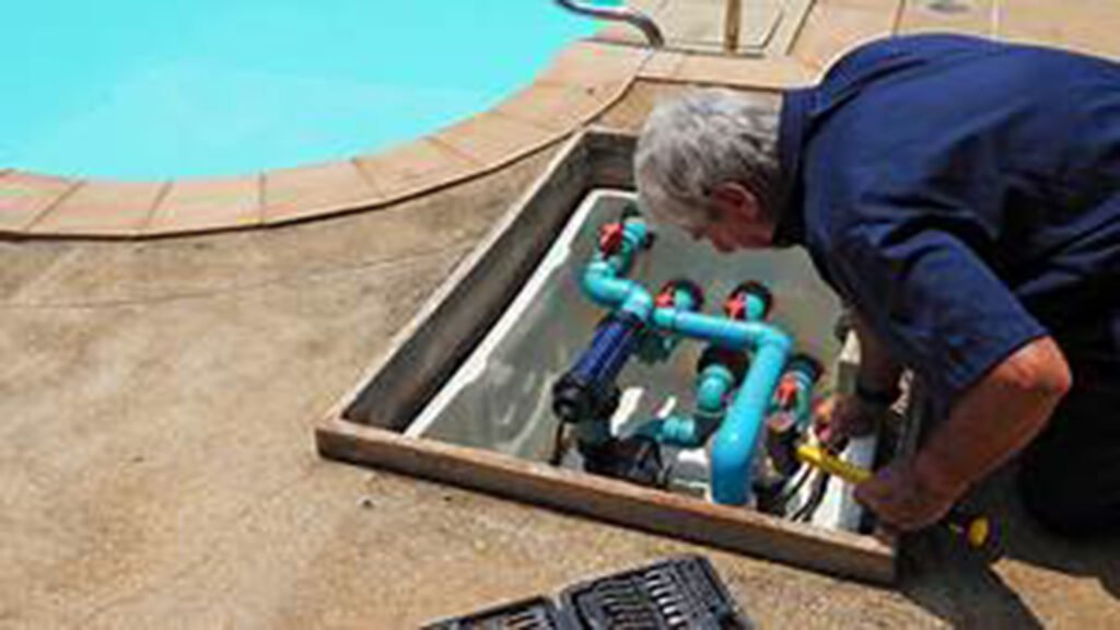 Pool repairman at work